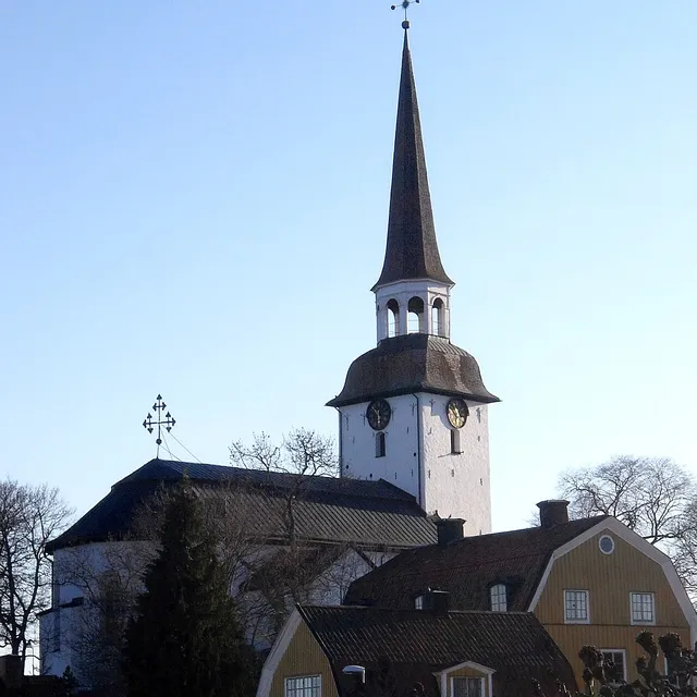 Mariefred's church and timber streets beside Gripsholm Castle